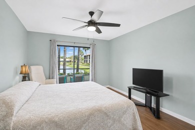 FIRST FLOOR UNIT - PRIME LAKEFRONT VIEWS. Wake up to serene - photo 4