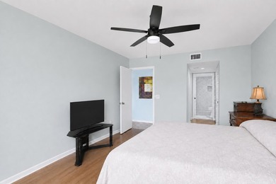FIRST FLOOR UNIT - PRIME LAKEFRONT VIEWS. Wake up to serene - photo 5