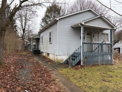 Bungalow-style ranch home situated on a dead-end street. Level - photo 1