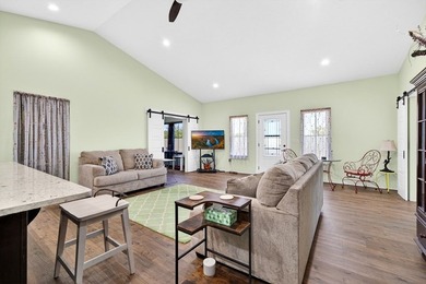 Lake living awaits in this beautiful 2024-built home located - photo 11