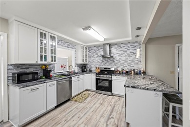 Updated ranch living in the Irondequoit 14617 area, tucked near - photo 12
