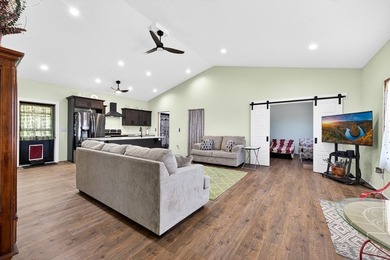 Lake living awaits in this beautiful 2024-built home located - photo 12