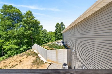 Lake living awaits in this beautiful 2024-built home located - photo 24