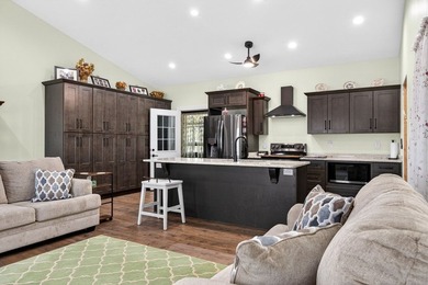 Lake living awaits in this beautiful 2024-built home located - photo 26