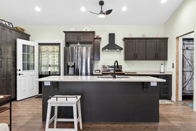Lake living awaits in this beautiful 2024-built home located - photo 27
