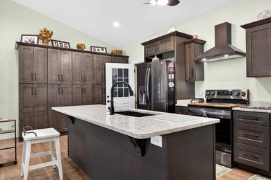 Lake living awaits in this beautiful 2024-built home located - photo 28