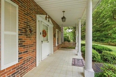 Experience timeless elegance and lakeside serenity at 99 Hilltop - photo 2