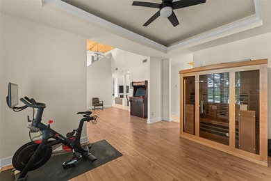 Set on an elevated corner homesite within Isleworth, this - photo 11