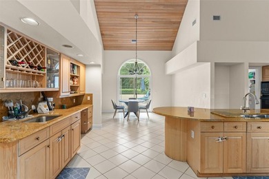 Set on an elevated corner homesite within Isleworth, this - photo 12
