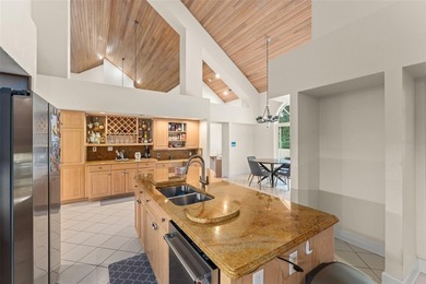 Set on an elevated corner homesite within Isleworth, this - photo 13