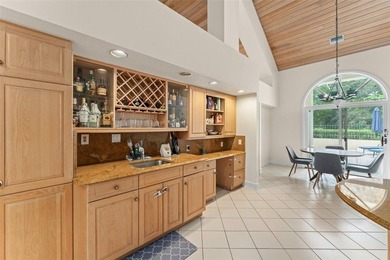 Set on an elevated corner homesite within Isleworth, this - photo 16