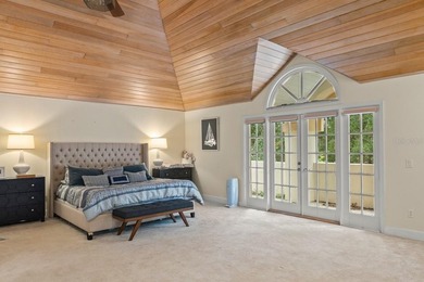 Set on an elevated corner homesite within Isleworth, this - photo 17