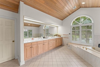 Set on an elevated corner homesite within Isleworth, this - photo 20