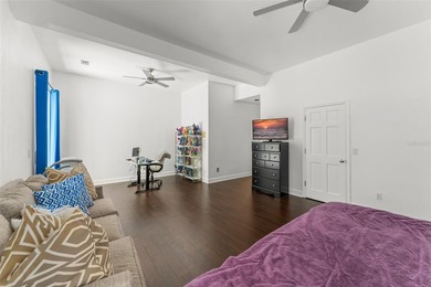 Set on an elevated corner homesite within Isleworth, this - photo 24