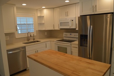 Introducing Unit 303 at French Village Condominiums, a charming - photo 5