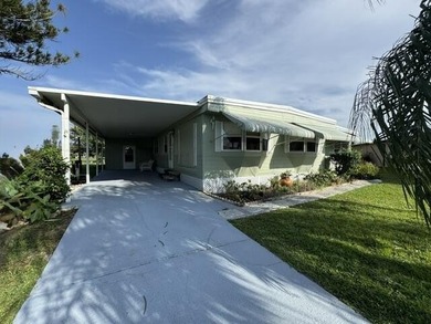 Welcome to this charming three-bedroom, two-bathroom mobile home - photo 1