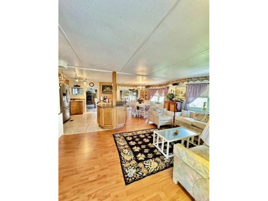 Welcome to this charming three-bedroom, two-bathroom mobile home - photo 2