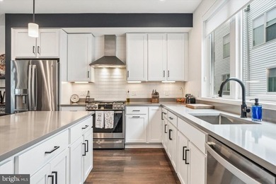Experience modern riverfront living at its finest in one of - photo 5