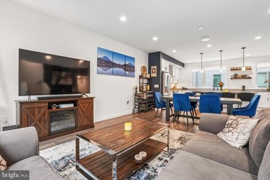 Experience modern riverfront living at its finest in one of - photo 9