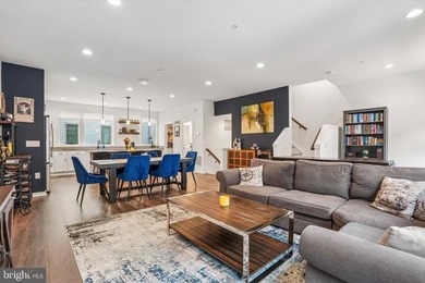 Experience modern riverfront living at its finest in one of - photo 10