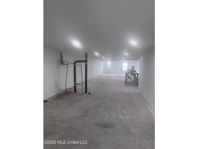 Endless possibilities await in this spacious two-story building - photo 4