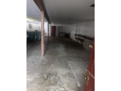 Endless possibilities await in this spacious two-story building - photo 5