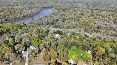 5-acre waterfront property located in the desirable River Bluffs - photo 1