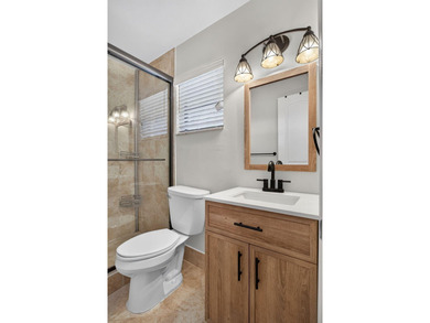 TASTEFULLY UPDATED END-UNIT VILLA WITH A BRAND NEW 2024 ROOF! - photo 11