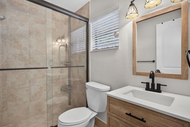 TASTEFULLY UPDATED END-UNIT VILLA WITH A BRAND NEW 2024 ROOF! - photo 12