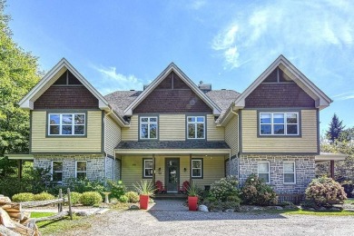 Lake Home For Sale in Mont-Tremblant,