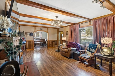 Welcome home to this beautifully maintained brick ranch situated