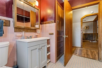 Welcome home to this beautifully maintained brick ranch situated