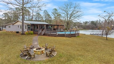 SUNSETS AND VIEWS FOR DAYS! This stunning fee simple lake home - photo 18