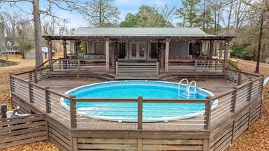 SUNSETS AND VIEWS FOR DAYS! This stunning fee simple lake home - photo 19