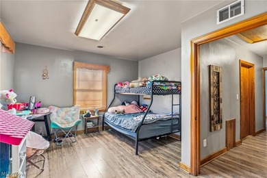 Welcome home to this beautifully maintained brick ranch situated