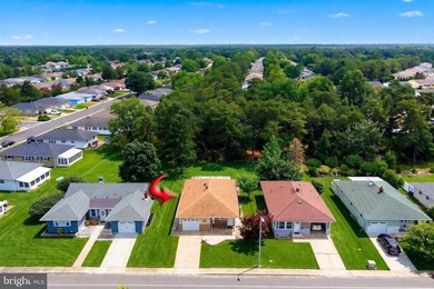 Experience worry-free living, in this meticulously renovated - photo 2