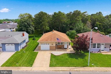 Experience worry-free living, in this meticulously renovated - photo 3