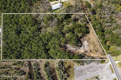 Over 5 acres conveniently located in Ocean Springs! Enjoy easy - photo 1