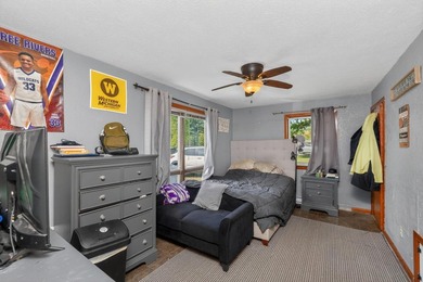 This four-bedroom, three-bath, 2,994-square-foot split level - photo 13