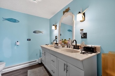 This four-bedroom, three-bath, 2,994-square-foot split level - photo 16