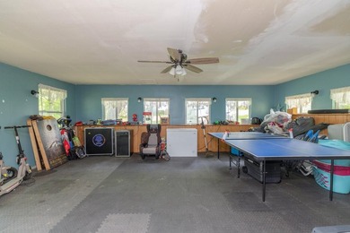 This four-bedroom, three-bath, 2,994-square-foot split level - photo 18