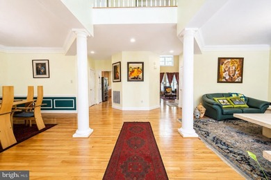 Nestled on a prominent corner lot in the coveted Watkins Pond - photo 6