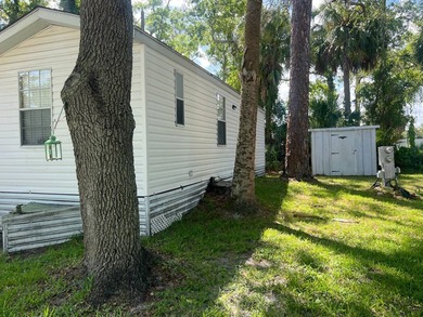 LOVELY HOME IN A WONDERFUL LOW LOT RENT PARK! This is a - photo 3