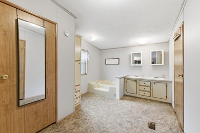 Perfectly positioned on a desirable corner lot, this spacious - photo 26