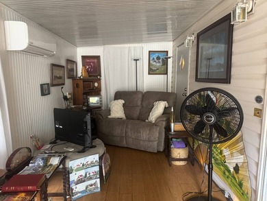 LOVELY HOME IN A WONDERFUL LOW LOT RENT PARK! This is a - photo 6