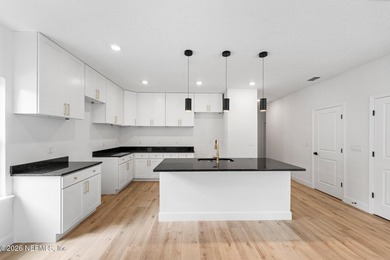 Welcome home to modern living, quality craftsmanship, and - photo 2