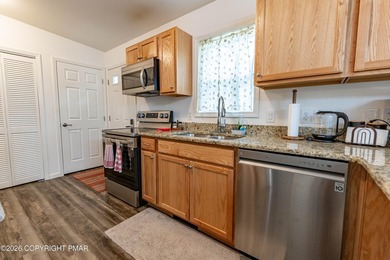 Built in 2023, this beautiful raised ranch offers the perfect - photo 4