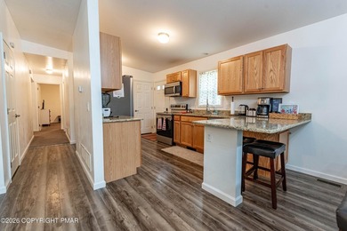 Built in 2023, this beautiful raised ranch offers the perfect - photo 5