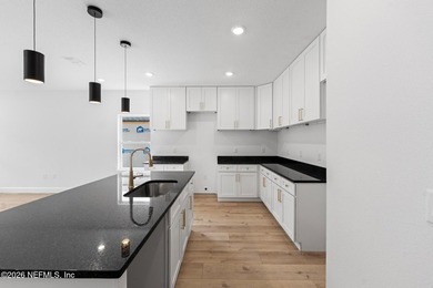 Welcome home to modern living, quality craftsmanship, and - photo 6