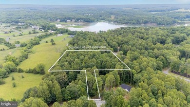 This 2.5 acre wooded property a gem! Enjoy this water access lot - photo 2